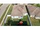 A private fenced backyard with lush green grass and a play set at 3512 Gerrads Cross Ct, Land O Lakes, FL 34638