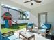 Relaxing patio with wicker furniture and view of the backyard playset at 3512 Gerrads Cross Ct, Land O Lakes, FL 34638