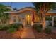 Charming home with a brick walkway, inviting porch, and manicured landscaping at 3620 W San Pedro St, Tampa, FL 33629