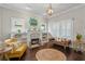 Bright living room with fireplace, built-in shelves, and stylish decor at 3620 W San Pedro St, Tampa, FL 33629