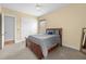 Bedroom featuring neutral walls, carpet, and a ceiling fan at 4515 W Leona St, Tampa, FL 33629