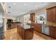Bright and airy kitchen features an island, stainless steel appliances, and a dining area at 4515 W Leona St, Tampa, FL 33629