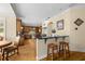 Well-appointed kitchen with a breakfast bar, custom cabinets, and easy access to the dining area at 4515 W Leona St, Tampa, FL 33629