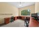 Spacious office with natural light, a large window, and built-in desks at 4515 W Leona St, Tampa, FL 33629