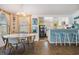 Bright dining area with a table, chairs, and a view into the kitchen, featuring a cheerful atmosphere at 526 5Th N Ave, Safety Harbor, FL 34695