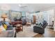 Inviting living room with comfortable seating, ceiling fan, and lots of natural light at 526 5Th N Ave, Safety Harbor, FL 34695