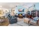 Comfortable living room with a view of the kitchen and dining area, showcasing open-concept living at 526 5Th N Ave, Safety Harbor, FL 34695