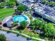 Aerial of the Town Center featuring a splash pad, green spaces, shops, and outdoor dining at 6030 Sandhill Ridge Dr, Lithia, FL 33547