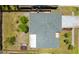 Aerial view of a home with a well-maintained roof and a spacious, fenced backyard at 6705 Ranger Dr, Tampa, FL 33615