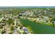 Community aerial showcases beautiful homes nestled amidst lakes, trees and waterways at 6705 Ranger Dr, Tampa, FL 33615