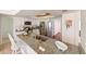 Kitchen featuring a stainless steel refrigerator, granite countertops, and breakfast bar at 6705 Ranger Dr, Tampa, FL 33615