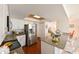 Bright kitchen featuring white cabinets, stainless steel appliances, and granite countertops at 6705 Ranger Dr, Tampa, FL 33615
