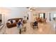 Open-concept living space with tile flooring and a dining area for entertaining guests at 6705 Ranger Dr, Tampa, FL 33615