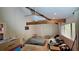 Bedroom featuring a window with blinds, ceiling fan, and closet space at 7111 Oregon Chickadee Rd, Weeki Wachee, FL 34613