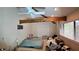 Bedroom with exposed beam, ceiling fan and closet at 7111 Oregon Chickadee Rd, Weeki Wachee, FL 34613