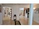 Spacious living room flows to the kitchen with sunroom, with hardwood floors at 7111 Oregon Chickadee Rd, Weeki Wachee, FL 34613