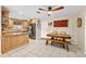 Eat-in kitchen featuring custom cabinets and stainless steel appliances at 8083 Bayhaven Dr, Seminole, FL 33776