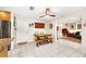 Eat-in kitchen features custom cabinets, modern appliances, and seating area at 8083 Bayhaven Dr, Seminole, FL 33776