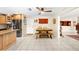 Eat-in kitchen featuring custom cabinets and stainless steel appliances at 8083 Bayhaven Dr, Seminole, FL 33776