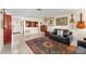 Bright living room with a front door and comfortable seating area at 8083 Bayhaven Dr, Seminole, FL 33776