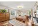The main bedroom is bright and spacious with hardwood floors and natural light at 8083 Bayhaven Dr, Seminole, FL 33776