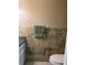 Bathroom featuring light tile flooring and a standard toilet at 8105 Sheldon Shores Dr, Tampa, FL 33615