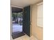 Entryway with a solid front door and a covered porch at 8105 Sheldon Shores Dr, Tampa, FL 33615