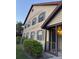 Charming home with a well-maintained lawn and inviting front porch entrance at 8105 Sheldon Shores Dr, Tampa, FL 33615
