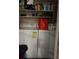 Laundry area with a stacked washer and dryer, providing convenience and functionality at 8105 Sheldon Shores Dr, Tampa, FL 33615
