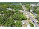 Breathtaking aerial view showcasing a lake and residential area, offering a serene and scenic location at 905 8Th Sw Ave, Largo, FL 33770