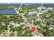 Aerial shot of the neighborhood highlights the proximity to businesses, water, and community spaces at 905 8Th Sw Ave, Largo, FL 33770
