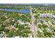 Scenic aerial view of a neighborhood near a lake, featuring lush greenery and a peaceful, Gathering-friendly atmosphere at 905 8Th Sw Ave, Largo, FL 33770