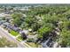 Expansive aerial view of the residential neighborhood with tree-lined streets and well-maintained homes in a vibrant community at 905 8Th Sw Ave, Largo, FL 33770