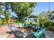 Spacious backyard featuring a brick patio, RV parking, and lush landscaping, creating a perfect outdoor retreat at 905 8Th Sw Ave, Largo, FL 33770
