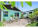Back exterior of shed with outdoor seating and RV parking in the backyard at 905 8Th Sw Ave, Largo, FL 33770