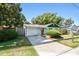 Inviting single-Gathering home with a well-maintained lawn, driveway, and vibrant landscaping enhancing its curb appeal at 905 8Th Sw Ave, Largo, FL 33770