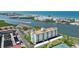 Coastal living featuring waterfront condos, canal access, and a community pool in a beautiful setting at 10216 Regal Dr # 310, Largo, FL 33774