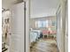 Bedroom view, with two twin beds with adjacent view of the bathroom at 10216 Regal Dr # 310, Largo, FL 33774