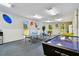 Ample recreation room featuring ping pong, air hockey, foosball, and vending machine at 10216 Regal Dr # 310, Largo, FL 33774