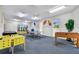 Bright recreation room including air hockey, ping pong, foosball, and card tables at 10216 Regal Dr # 310, Largo, FL 33774