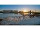 Relaxing lounge area with Adirondack chairs overlooking waterfront views at 10216 Regal Dr # 310, Largo, FL 33774