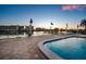 Beautiful pool area with waterfront views, perfect for relaxation and recreation at 10216 Regal Dr # 310, Largo, FL 33774