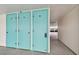 Hallway of outdoor turquoise storage units at 10216 Regal Dr # 310, Largo, FL 33774