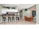 Open living room connects kitchen and dining area at 10305 Worthy Lamb Way, New Port Richey, FL 34654