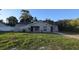 Charming single-story home featuring a well-maintained lawn and a classic architectural design at 11259 Elgin Blvd, Spring Hill, FL 34608