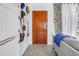 Close up shot of entryway featuring hard surface floors and wood door at 11376 119Th Ter, Largo, FL 33778
