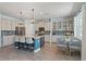 Bright kitchen with a large island, breakfast nook, stainless steel appliances, and stylish backsplash at 11742 Lake Lucaya Dr, Riverview, FL 33579