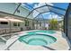 Beautiful outdoor oasis featuring a pool and spa, perfect for relaxation and entertaining guests at 11742 Lake Lucaya Dr, Riverview, FL 33579