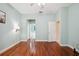 Open and airy bedroom with hardwood floors, an ensuite bathroom, and a bright, calming atmosphere at 12435 Oak St, San Antonio, FL 33576