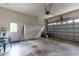 Spacious garage with ample storage and a clean, functional layout, perfect for parking and organizing your belongings at 12435 Oak St, San Antonio, FL 33576